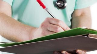 Doctor with clipboard
