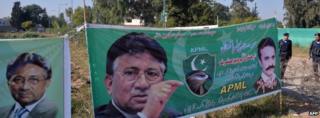 Banners showing images of former Pakistani military ruler Pervez Musharraf near his residence in Islamabad (November 2013)