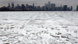 Snow-covered Lake Michigan with Chicago in the background. Photo: 25 December 2013