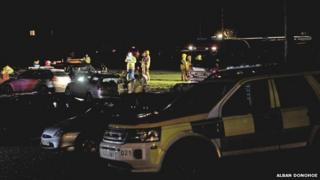 Emergency services at scene of crash in Cley