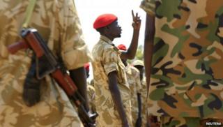 South Sudanese soldiers gather for a briefing at the army general headquarters in Juba