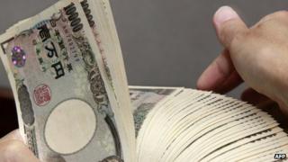 yen notes being counted