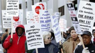 Protesters rally outside a Detroit, Michigan, court on 23 October 2014