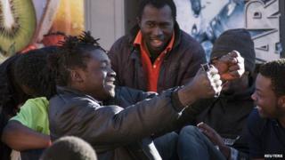 Migrants celebrating after getting into Melilla, 28 Feb 14