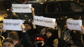 Pro-Russian protesters holding signs that read 'Referendum!. in Crimea in Ukraine - 6 March 2014