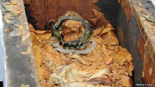 The opened coffin in Xilin Hot