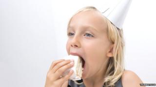 Girl eating cake