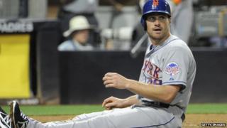 Daniel Murphy sits on the infield dirt during a baseball game on 15 August, 2013.