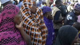 Mothers of kidnapped school girls react during a meeting with the Borno State governor in Chibok - 22 April 2014