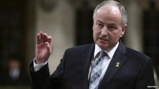 Canada"s Defence Minister Rob Nicholson speaks during Question Period in the House of Commons on Parliament Hill in Ottawa 3 March 2014
