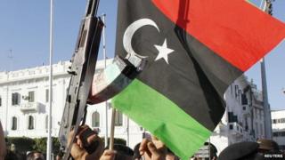 Libyan flag with gun at Green Square in Tripoli