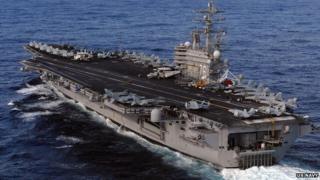 A US Nimitz-class aircraft carrier in the Pacific Ocean