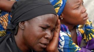 Mothers of the missing Chibok schoolgirls abducted by Boko Haram Islamists gather to receive information from officials on 5 May 2014