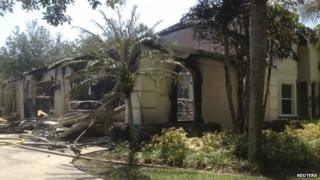 A house owned by former tennis pro James Blake is seen after a fire, in this handout photograph provided by Hillsborough Fire Rescue in Tampa, Florida 7 May 2014