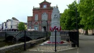 Wreaths and crosses from the monument were thrown into the river