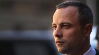 Oscar Pistorius leaves North Gauteng High Court after the judge ordered that he should undergo mental evaluation on May 14, 2014 in Pretoria, South Africa.