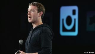 Mark Zuckerberg in front of Instagram logo