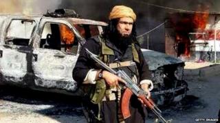 A gun-toting Isis militant