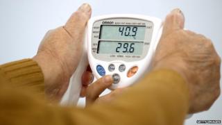 A woman has her Body Mass Index measured in Mexico City on 20 August, 2009.