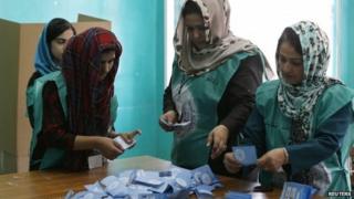 Afghan election officials count ballots