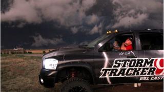 Val and Amy Castor in their truck