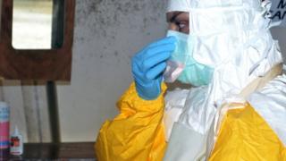 An MSF Ebola worker in Guinea - July 2014