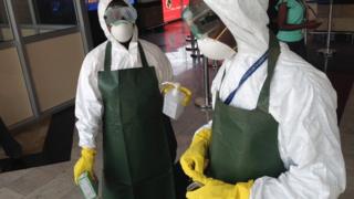 Employees at Entebbe airport in Uganda