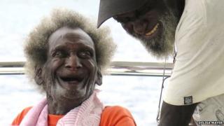 Eroni Kumana (left) with his son Sore