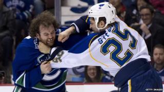 Chris Stewart of the Buffalo Sabres previously played for the St Louis Blues (right)