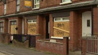 Home of a Eastern European woman in Belfast, with racist graffiti