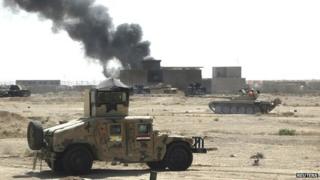 Iraqi troops clash with Islamic State militants, on the outskirts of Ramadi. 20 Sept 2014
