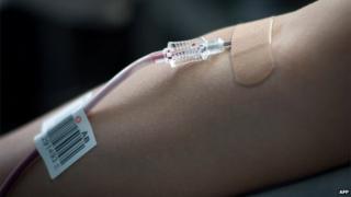This picture shows a needle in the arm of a patient in Beijing on 7 August, 2012