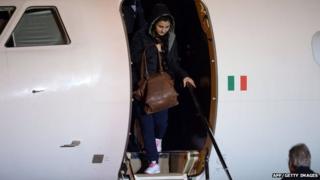 Vanessa Marzullo is welcomed by Italy's Minister of Foreign Affairs, Paolo Gentiloni (R) as she arrives at Ciampino airport in Rome.