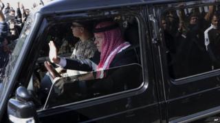 King Abdullah greets crowds after his return home from the US - 4 February