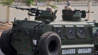 Nigerian soldiers patrol with a armoured vehicle in the city of Abuja, Nigeria, Saturday, 7 Feb, 2015