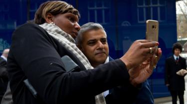 Sadiq Khan poses for a selfie on the campaign trail