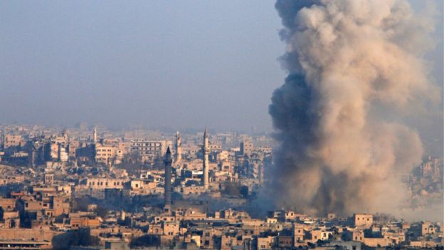 Smoke rises as seen from a rebel-held area of Aleppo, Syria December 12, 2016