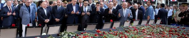 Turkish President Tayyip Erdogan prays for the airport employees who were killed in an attack on Ataturk airport in Istanbul, Turkey, 2 July