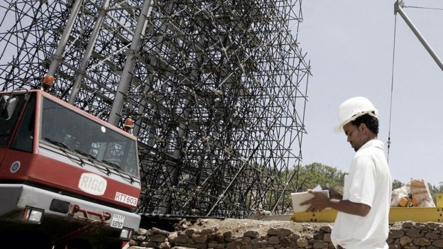 A worker stands on a building site in Axum, Ethiopia. 4 June 4, 2008