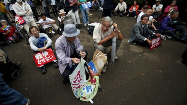 Protesters take part in a rally against Prime Minister Shinzo Abe's security bill outside parliament in Tokyo - 18 September 2015