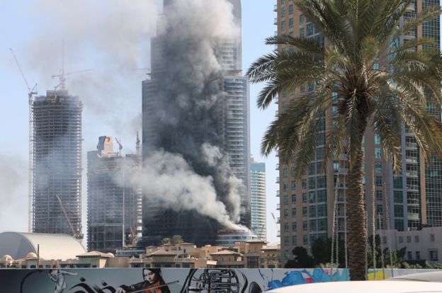 Smoke billows from the Address Downtown Hotel in Dubai, 1 January, 2016