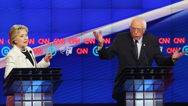 Hillary Clinton and Bernie Sanders during a TV debate.