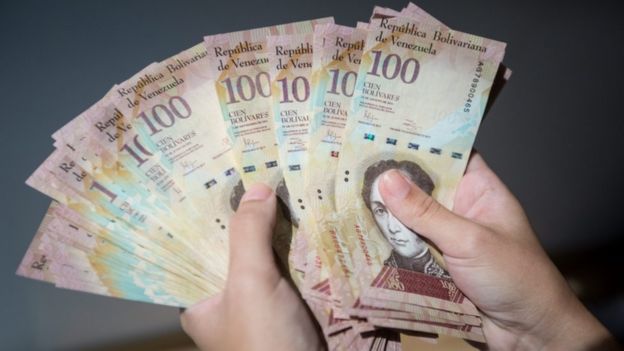 View of 100 Bolivares bills in Caracas, Venezuela, 12 December 2016