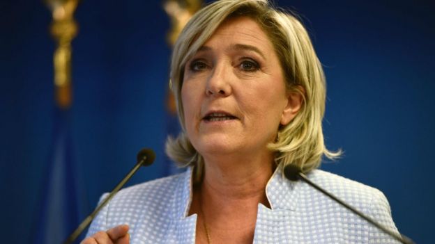 President of the French far-right party and presidential candidate for the 2017 French Presidential elections Marine Le Pen delivers a speech during a press conference on november 9, 2016 in the party headquarters inNanterre, near Paris, following the victory by US Republican candidate Donald Trump in US presidential elections.