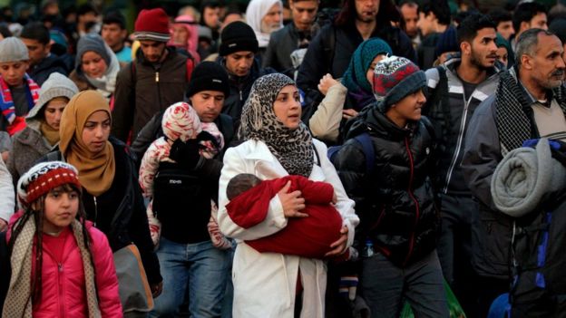 Refugees and migrants disembark from a ferry at the port of Piraeus coming from the island of Lesvos, Greece, 10 February 2016