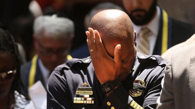 Dallas Police Chief David Brown pauses at a prayer vigil following the deaths of five police officers last night during a Black Live Matter march on July 8, 2016 in Dallas,