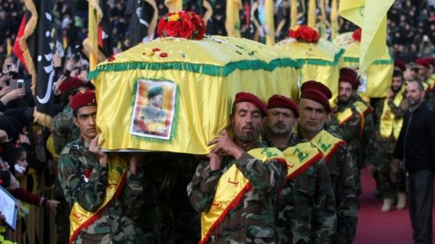 Hezbollah fighters in Nabatiyeh, Lebanon, carry the Hezbollah flag-draped coffins of Shia fighter killed in Syria supporting Syrian government forces (27 October 2015)