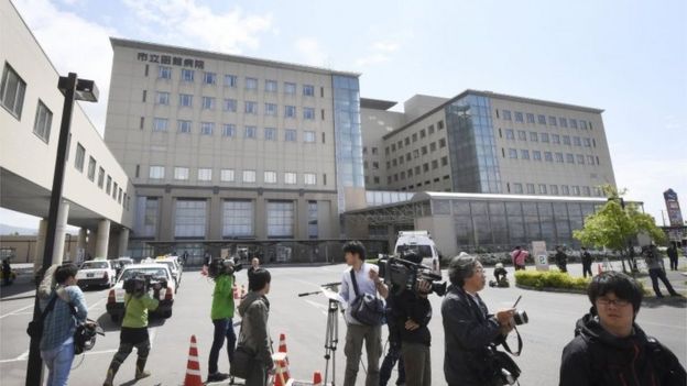 Media gather outside the hospital where the boy has been taken in Hakodate, Hokkaido (3 June 2016)