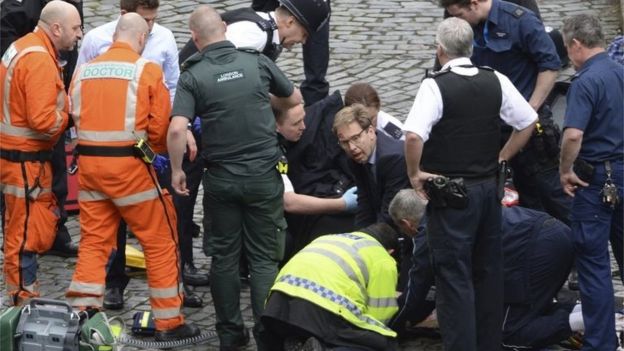 Tobias Ellwood and emergency services try to save PC Palmer's life