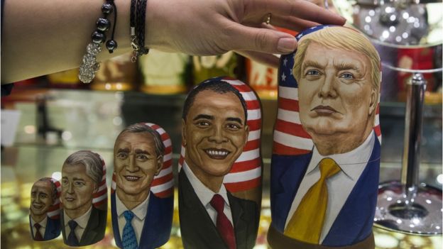 Traditional Russian wooden dolls depict US presidents, including president-elect Trump